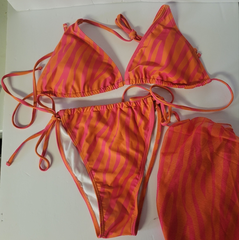 Bikini with matching wrap skirt cover up
